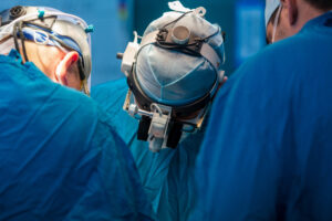 Surgical,Team,Operating,A,Patient,In,An,Operation,Theater.,Surgeon