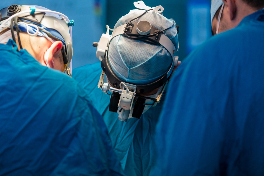 Surgical,Team,Operating,A,Patient,In,An,Operation,Theater.,Surgeon
